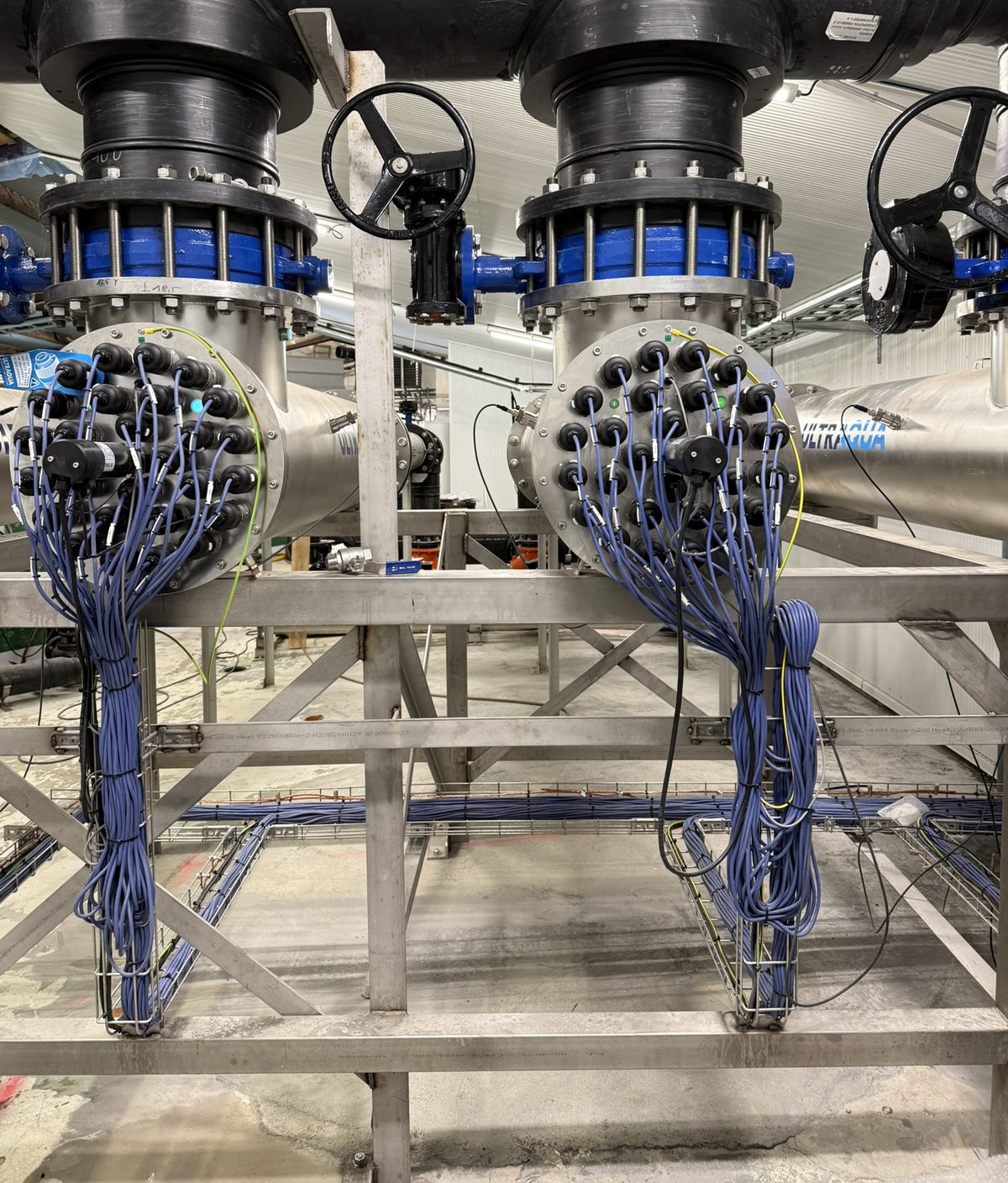 Cabling to two UV systems, neatly routed in cable trays